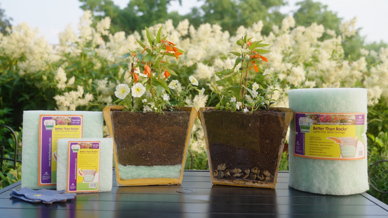Garden center wholesale display featuring Better Than Rocks alongside planters and gardening supplies, showcasing retail-ready packaging and point-of-sale setup.