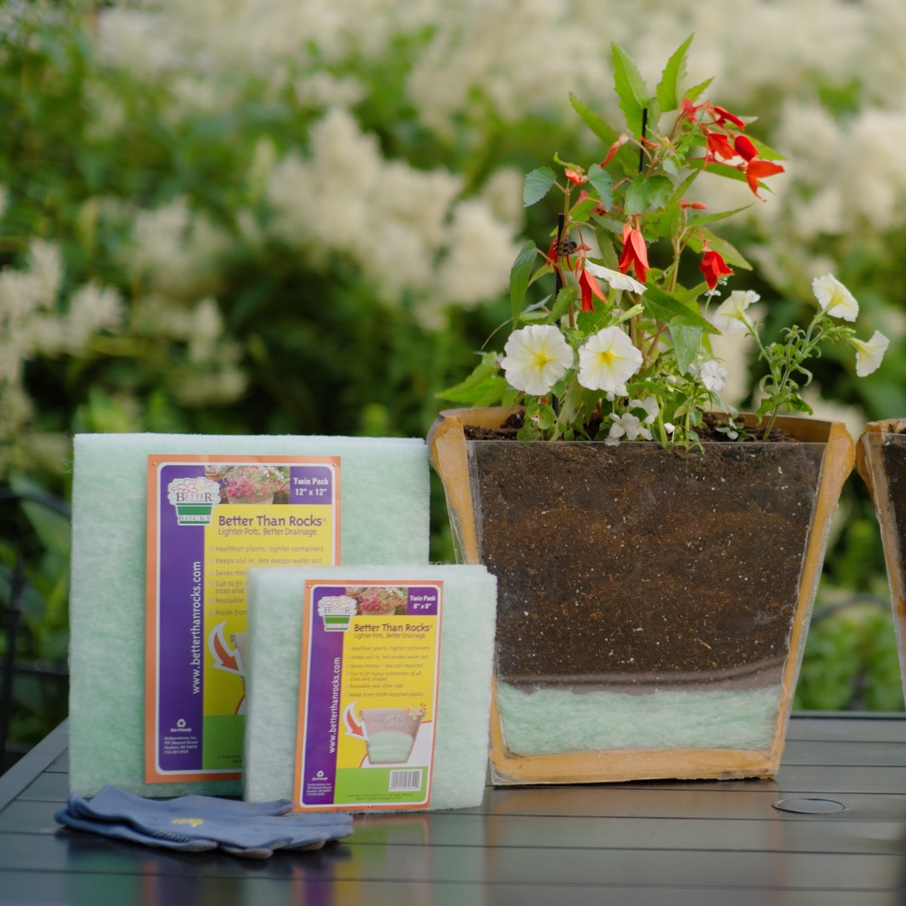 Packaged Better Than Rocks drainage material beside potted plant.